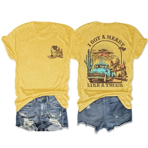 Λεπτομέρεια vintage κίτρινου t-shirt με δυτικό γραφικό τύπωμα, φορτηγό και κάκτο