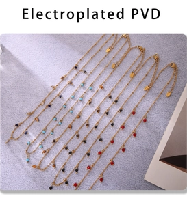 Detail of 18K gold plated PVD necklaces with colorful natural stone beads and tags
