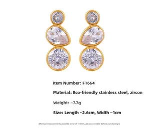 Detail of 18K gold-plated stainless steel teardrop earrings with cubic zirconia stones