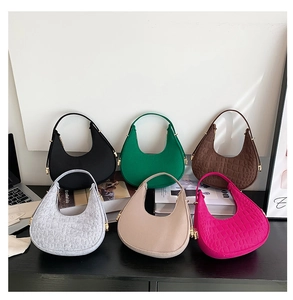Detailed collection of crescent moon bags in various textures and vibrant colors