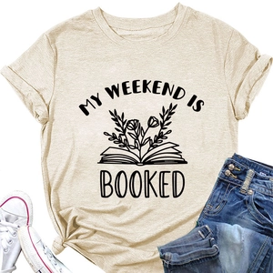 Flat lay of apricot crew neck tee with My Weekend Is Booked floral book print