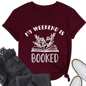 Close-up of My Weekend is Booked text and floral graphic on burgundy crewneck T-shirt