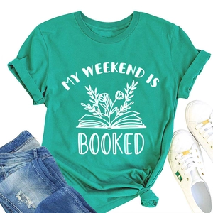 Flat lay of a turquoise round neck t-shirt with My Weekend Is Booked floral book print