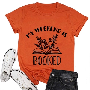 Casual flat lay of orange cotton t-shirt with black My Weekend is Booked graphic print