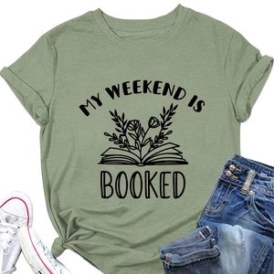 Detail of green cotton T-shirt featuring My Weekend is Booked graphic and floral book art