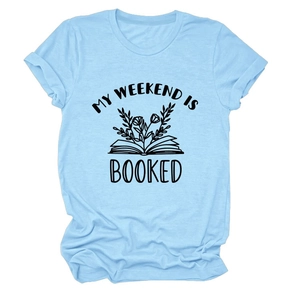 Detail of the light blue t-shirt featuring MY WEEKEND IS BOOKED text and book graphic