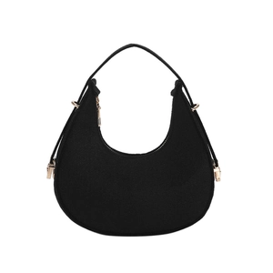 Minimalist black crescent moon hobo bag with textured fabric and gold zipper details