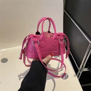 Chic magenta PU leather shell handbag with top handles and adjustable shoulder strap