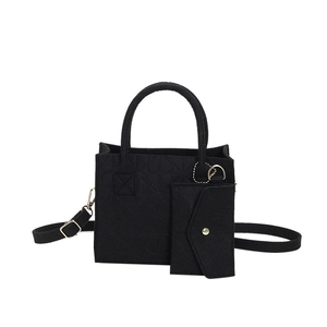Minimalist black felt tote bag set with heart stitching and adjustable shoulder strap