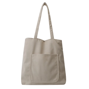 Sac fourre-tout minimaliste en velours côtelé beige avec poche frontale et bouton pression