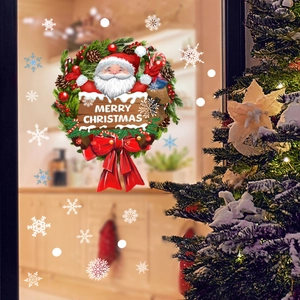 Christmas window sticker featuring Santa wreath and snowflakes on a glass door background