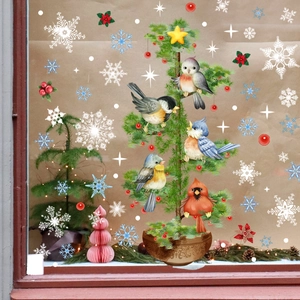 Christmas window decals with colorful birds, snowflakes, and pine tree glass decorations