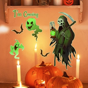 Detailed view of luminous Halloween wall stickers featuring ghosts and a grim reaper design