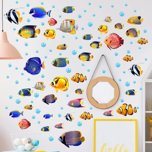 Detail of colorful tropical fish and bubble wall decals in a modern living room setting