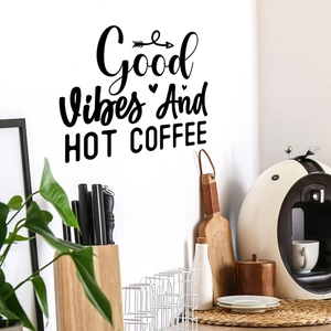 Modern black COFFEE vinyl wall decal with Good Vibes text in minimalist kitchen interior