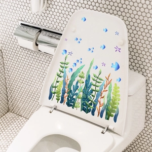 Stickers de plantes marines et poissons sur abattant de WC blanc pour la salle de bain