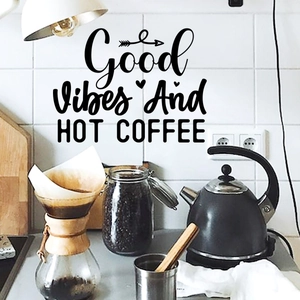 Minimalist Good Vibes and Hot Coffee wall sticker on a white tiled kitchen background