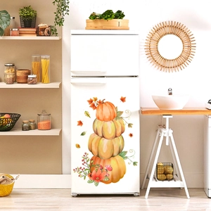 Autumn maple leaf pumpkin wall decals on white fridge in warm cozy kitchen decor