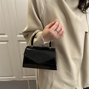 Elegant black patent leather mini square handbag with gold chain and top handle