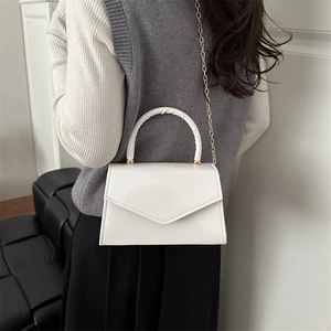 White minimalist envelope crossbody bag with glossy PU leather and gold chain strap