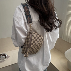 Retro crescent crossbody chest bag with vintage monogram and geometric strap