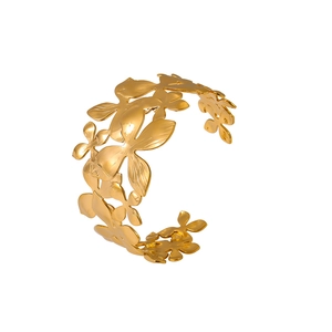 Golden 18K plated stainless steel open cuff bracelet with intricate floral petal texture