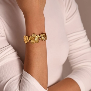 Elegant gold-plated floral cuff bracelet with five-petal flower link design for women