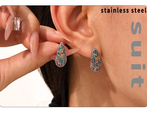 Detail of tear-drop stud earrings with colorful pavé rhinestones on stainless steel