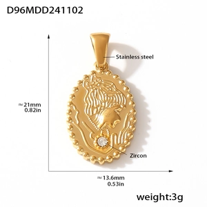 Macro detail of 18K gold plated stainless steel oval pendant with zircon stone