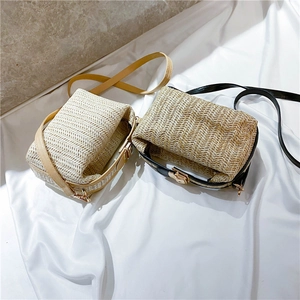 Fashionable woven crossbody beach bag in beige and light coffee with golden twist lock