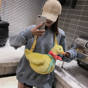 Cute yellow plush duck crossbody bag with ribbon bow and adjustable strap for women