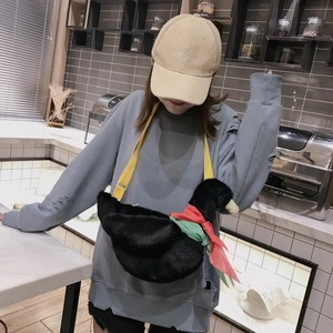 Cute black plush duck crossbody bag with polka dot scarf and adjustable strap for women