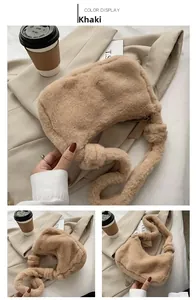 Detail of khaki plush crossbody bag featuring soft faux fur and knotted shoulder strap