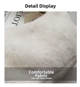 Close-up of fluffy white faux rabbit fur texture on a compact fashion shoulder bag