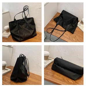 Detailed four-view display of a large black nylon tote bag with reinforced shoulder straps