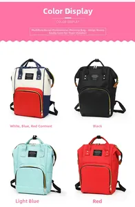Waterproof diaper bag backpack in four colors: navy-white-red, black, light blue, and red