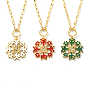 Christmas snowflake pendant necklaces in white, red, and green with crystal accents