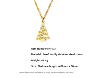 Close-up of golden stainless steel Christmas tree pendant with zircon stones