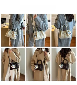 Minimalist tote bag styling in beige and brown with adjustable strap and puppy charm