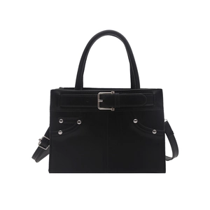 Structured black leather handbag with silver buckles and stud details in a matte finish