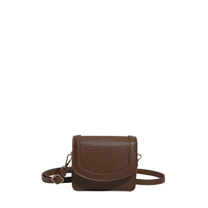 Brown lychee leather shoulder bag with a minimalist flap design and gold hardware