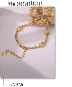 Detail of 18K gold plated stainless steel bracelet with hand-set cubic zirconia stones