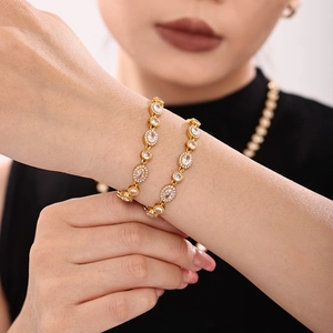 Luxurious 18K gold plated bracelet with oval cubic zirconia halo link for women