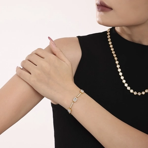 Gold-plated stainless steel bracelet with rectangular zircon crystals and pave setting