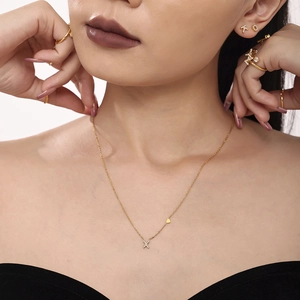 Gold-plated PVD titanium steel jewelry set with Zircon 'X' pendant and heart charm necklace