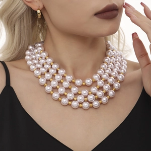 Élégant collier de perles multicouche à quatre rangs avec perles dorées d'espacement