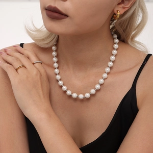 Elegant 12mm shell pearl necklace with golden rice beads and stainless steel clasp