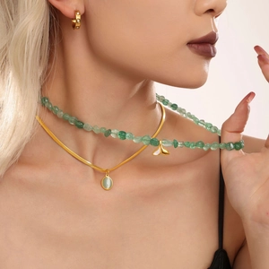 Double-layered gold snake chain necklace with green natural stone and fishtail shell pendant