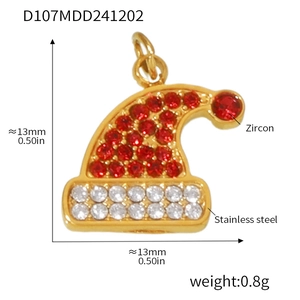 Macro view of Christmas hat pendant with red and white zircons and size details