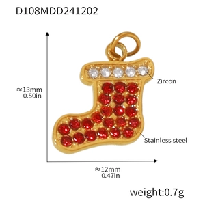 Close-up of gold stainless steel Christmas sock pendant with red and white zircon